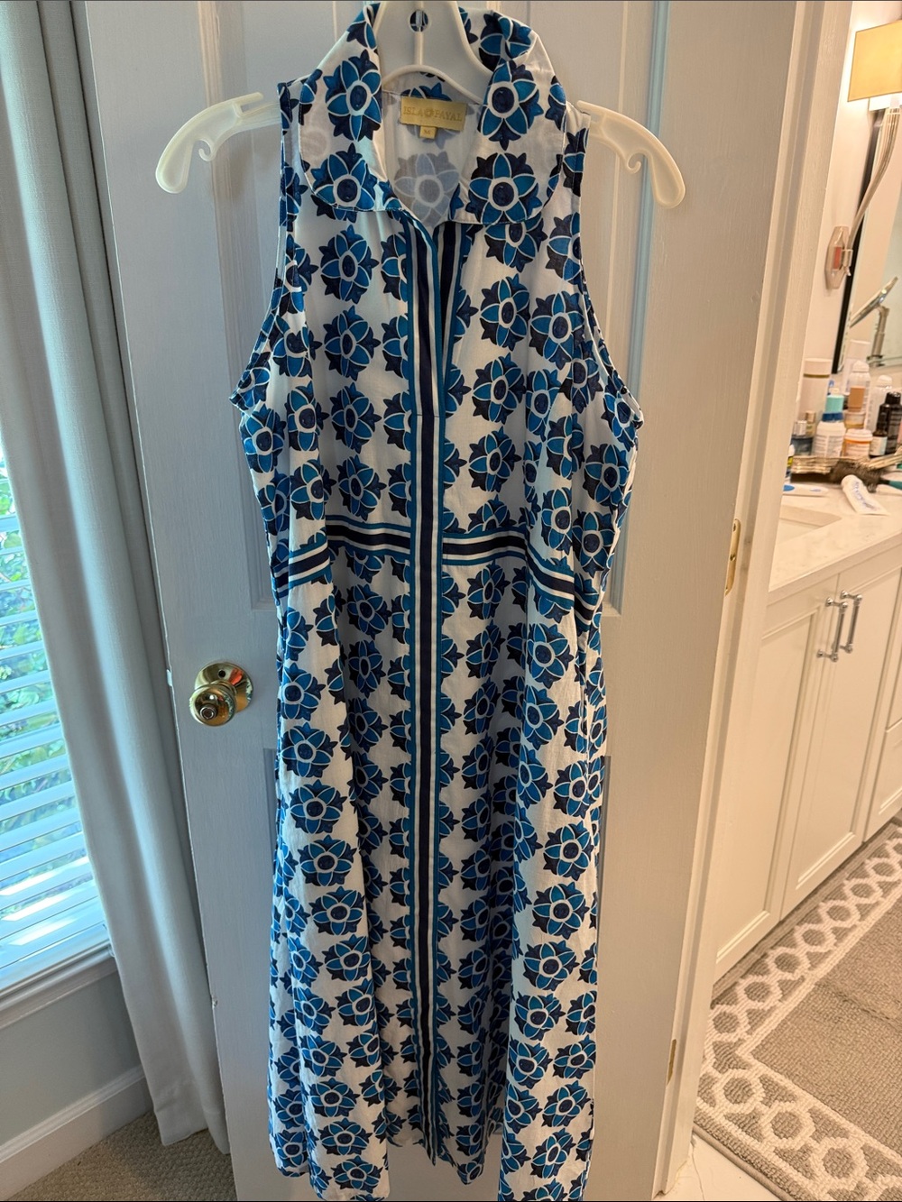 Isla Payal Sleeveless Blue Floral v neck Dress with tie back and pockets